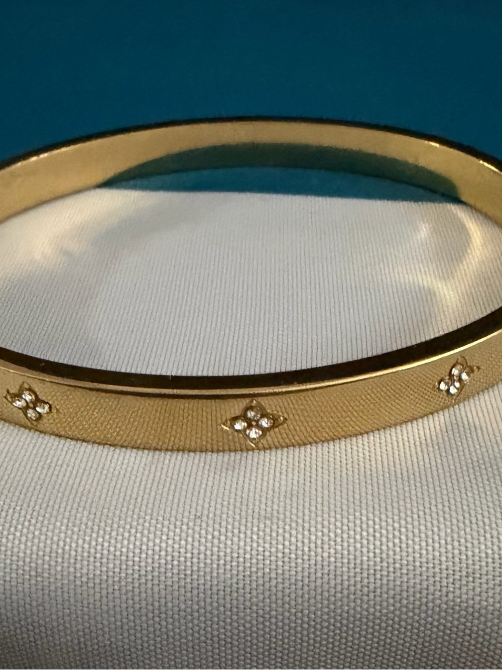Gold Tone Bangle Bracelet with Crystal Star Accent - Picture 2 of 4